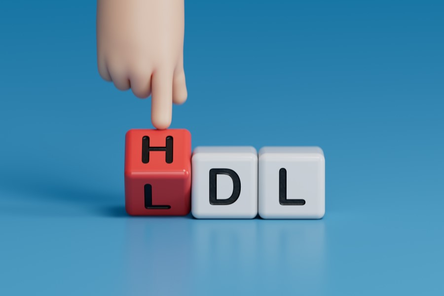 Rysunkowa ręka wskazuje na cholesterol HDL.