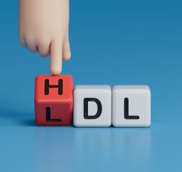 Rysunkowa ręka wskazuje na cholesterol HDL.