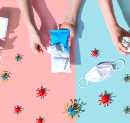 Różowo-niebieskie tło, na tle maseczka ochronna, cząsteczki wirusa oraz dłonie podczas dezynfekcji.