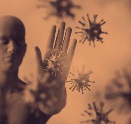 Człowiek symbolizujący układ odpornościowy, który chroni organizm przed wirusami.